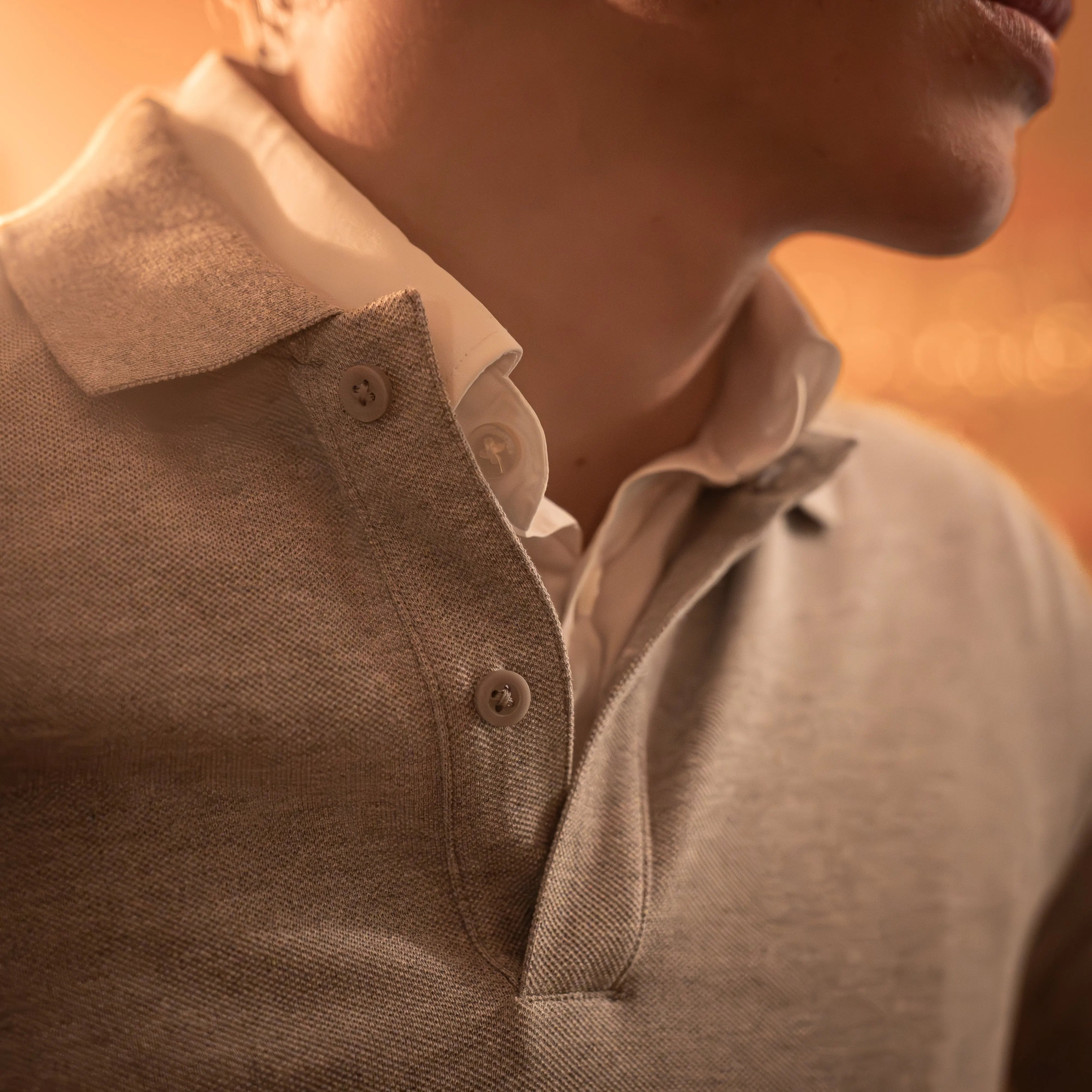Handprinted Donce de la Sense Polo Long Sleeve, showcasing bespoke craftsmanship with matching buttons and side seam slits.